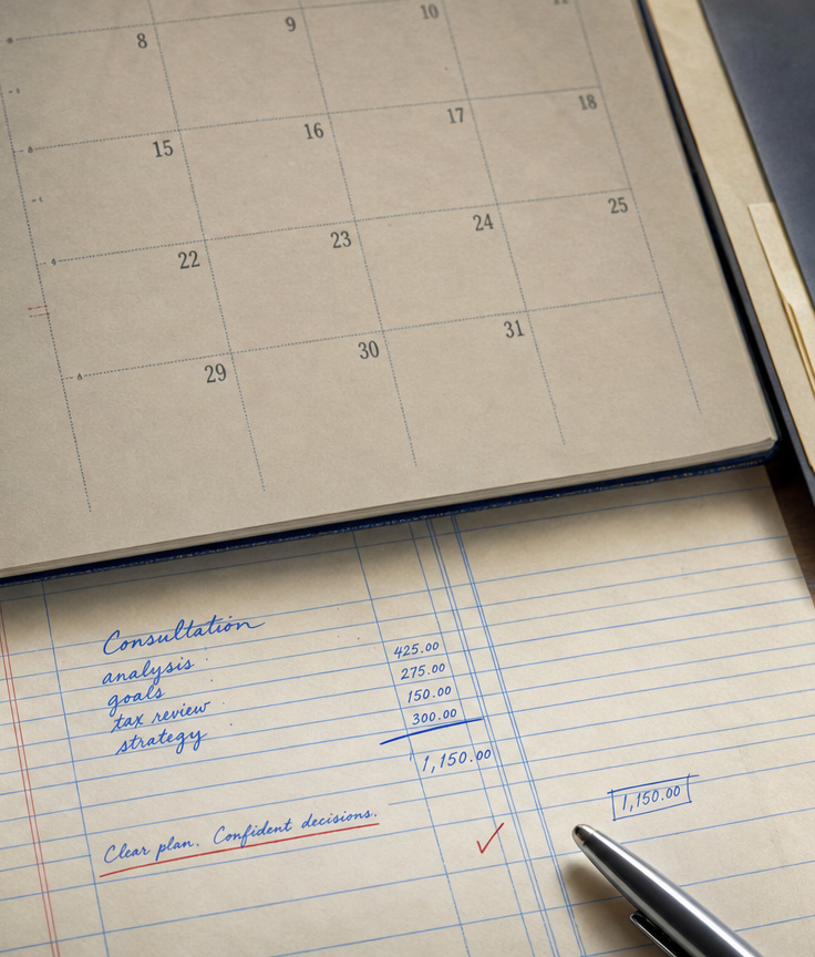 An appointment calendar on a handwritten accounting ledger